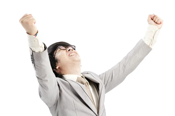 Uomo d'affari di successo che festeggia a braccia aperte isolato su uno sfondo bianco — Foto Stock