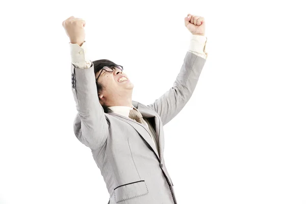 Successful businessman celebrating with arms up - isolated over a white background — Stock Photo, Image