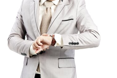 İş adamı saatini kontrol ediyor.