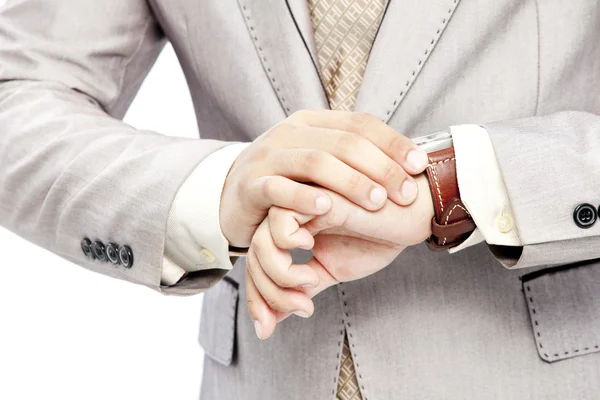Businessman checking the time on his watch — Stock Photo, Image