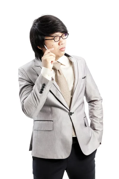 Portrait of young thoughtful businessman isolated over white background — Stock Photo, Image