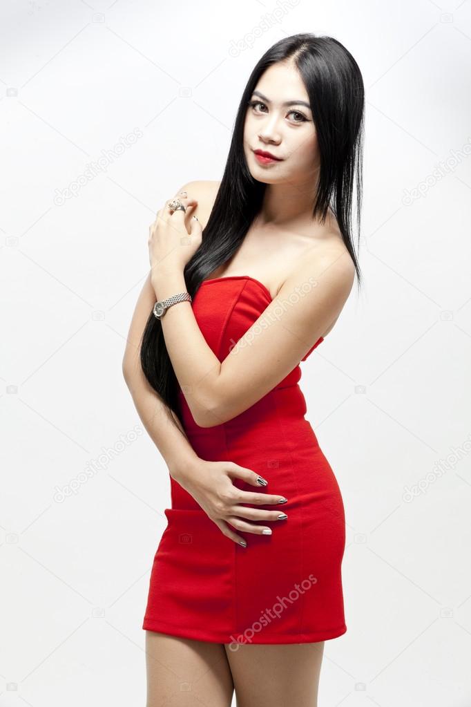 Sexy asian woman in beautiful red dress
