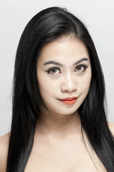 Beau visage de jeune femme asiatique — Photo