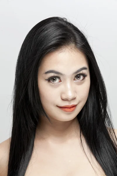 Beautiful face of young asian woman — Stock Photo, Image