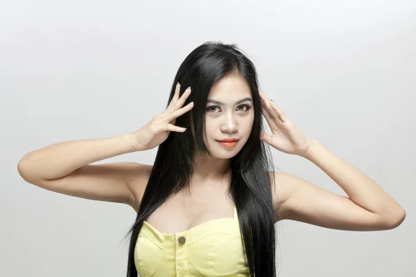 Bonito rosto de jovem mulher asiática — Fotografia de Stock