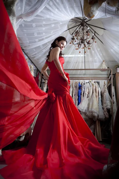 Beautiful asian woman in luxury red dress — Stock Photo, Image