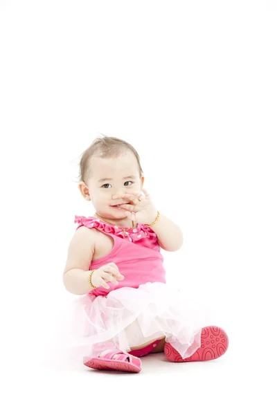 Cute baby girl in pink clothes — Stock Photo, Image