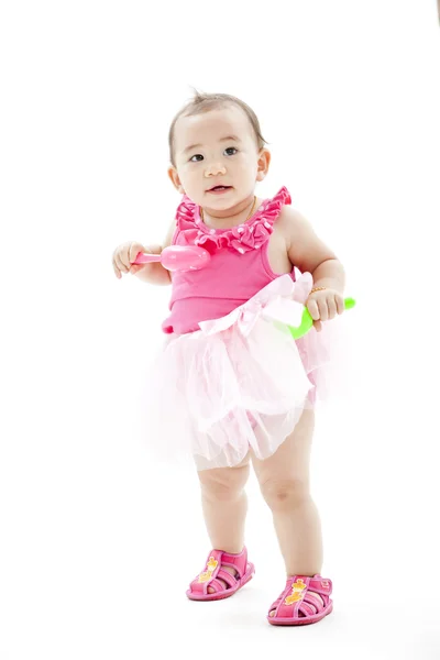 Cute baby girl in pink clothes — Stock Photo, Image