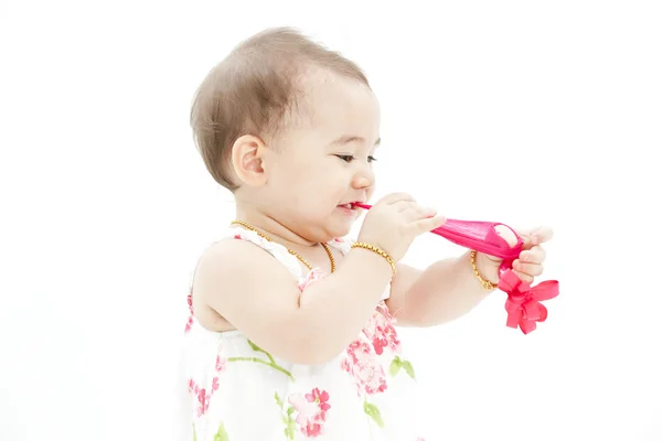 Schattige babymeisje in mooie jurk — Stockfoto