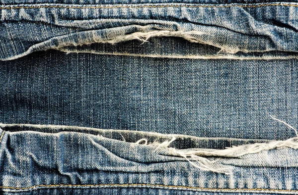 Geripte vintage jeans — Stockfoto