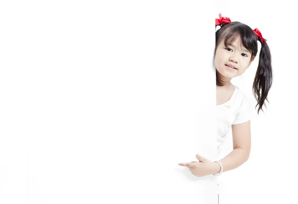 Young Asian girl holding a blank white card. — Stock Photo, Image