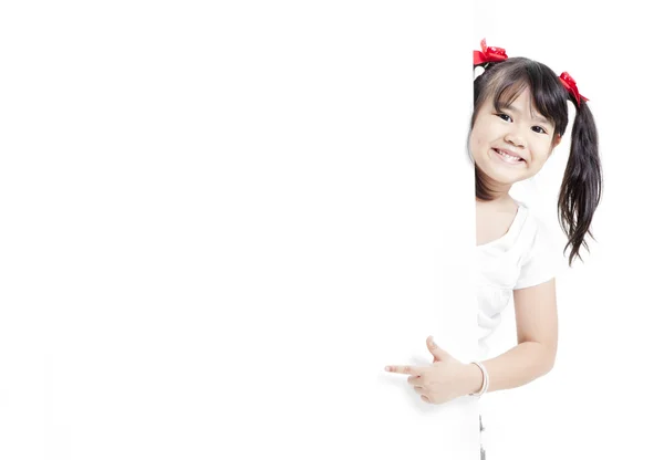 Young Asian girl holding a blank white card. — Stock Photo, Image