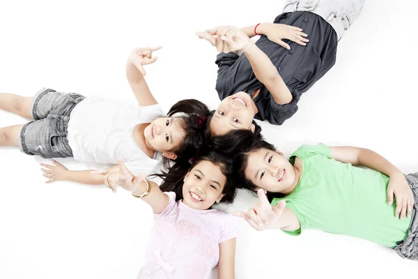 Niños jugando sobre un fondo aislado —  Fotos de Stock