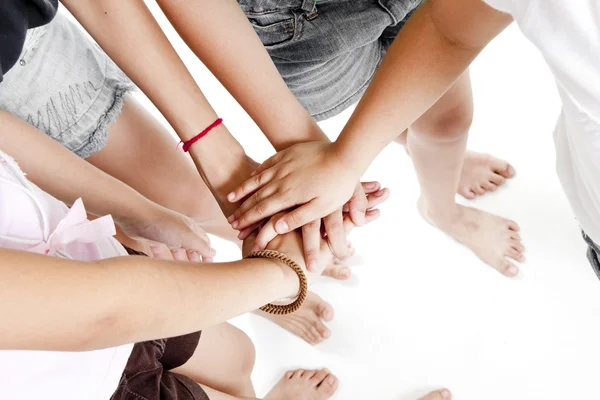 Asian children's hands together on a white background — Stock Photo, Image