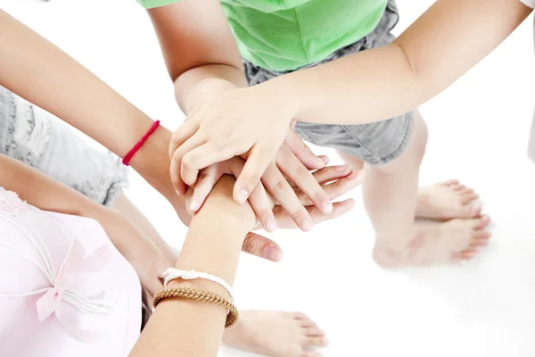 Aziatische de handen van kinderen samen op een witte achtergrond — Stockfoto