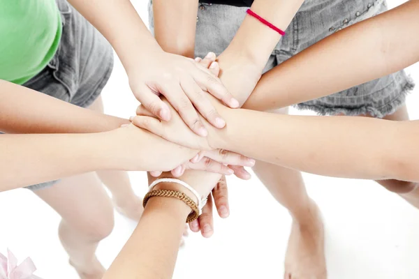 Aziatische de handen van kinderen samen op een witte achtergrond — Stockfoto