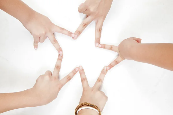 Aziatische kinderen handen ster op een witte achtergrond — Stockfoto