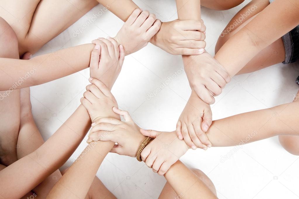 Asian children's hands circle on a white background