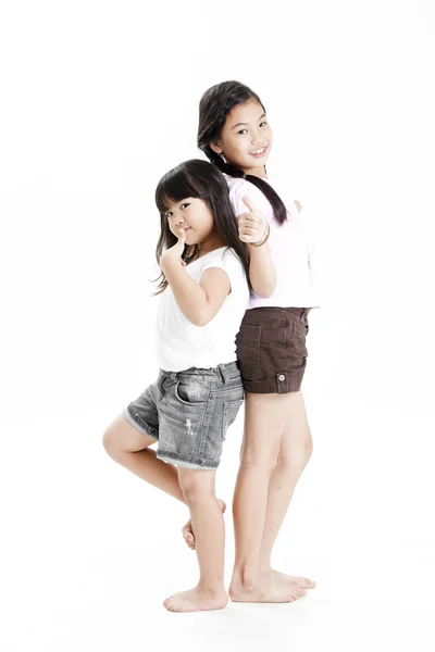 Portrait of a little girls playing each other — Stock Photo, Image