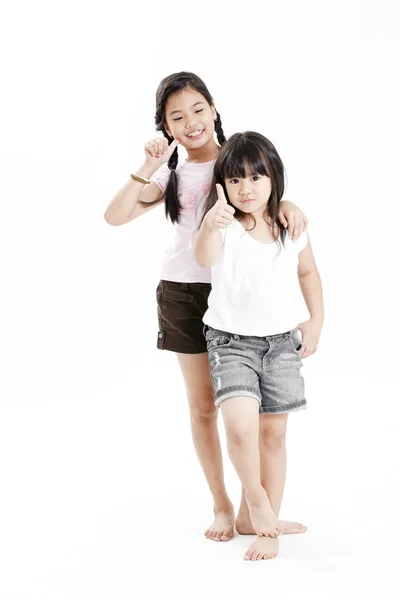 Portrait of a little girls playing each other — Stock Photo, Image