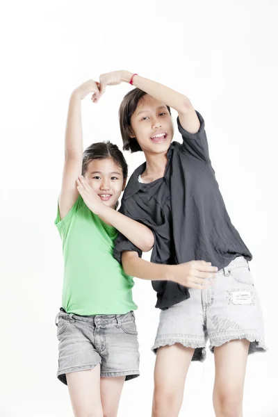 Portrait of a funny little asian girls playing — Stock Photo, Image