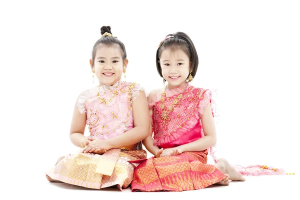 Portrait of sitting smiling Thai girl — Stock Photo, Image