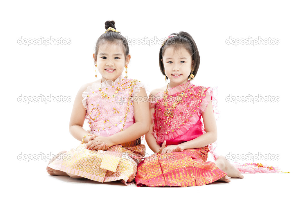 Portrait of sitting smiling Thai girl