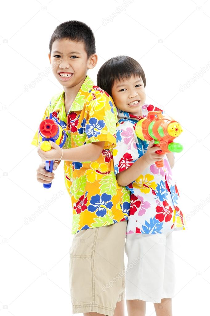 Two asian boys with waterguns