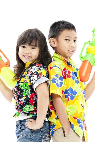 Girl and boy with waterguns — Stock Photo, Image