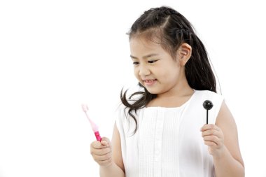 şirin Asyalı kız ve lolipop