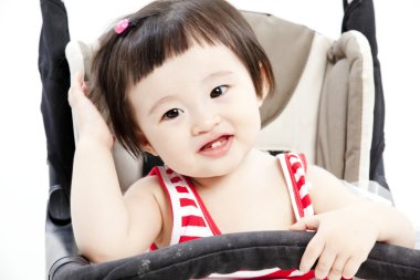 Bebek arabasındaki bebek oturma