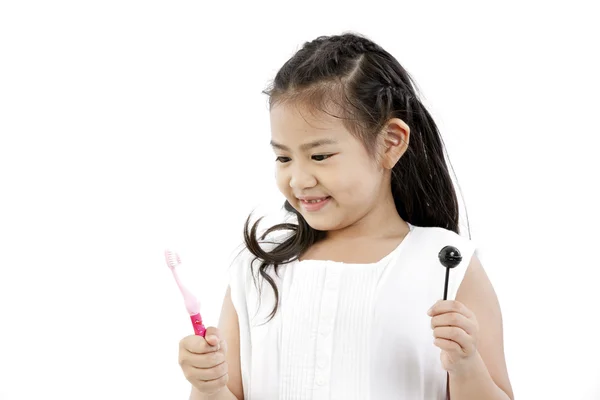 Cute asian girl and lollipop — Stock Photo, Image