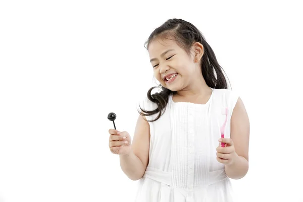 Bonito ásia menina e pirulito — Fotografia de Stock