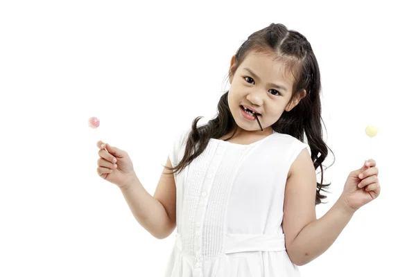 Beautiful little girl with lollipop — Stock Photo, Image