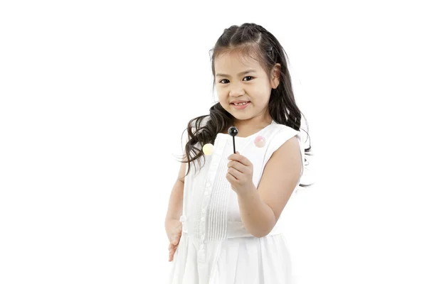 Gadis kecil yang cantik dengan lolipop — Stok Foto