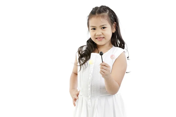 Vacker liten flicka med lollipop — Stockfoto