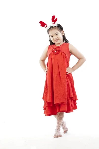 Portrait of happy little girl in Santa dress — Stock Photo, Image