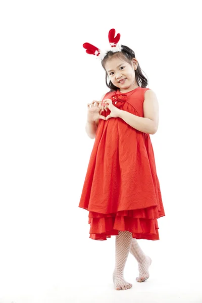 Portrait of happy little girl in Santa dress — Stock Photo, Image