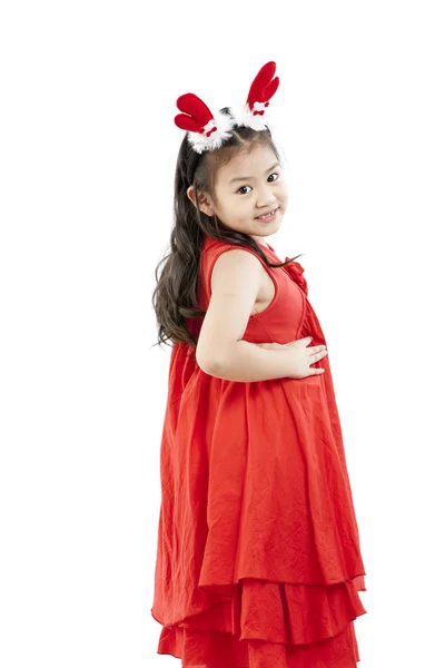 Portrait of happy little girl in Santa dress — Stock Photo, Image