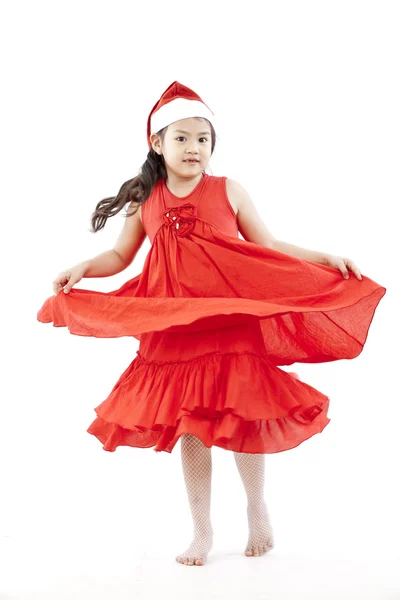 Portrait of happy little girl in Santa dress — Stock Photo, Image