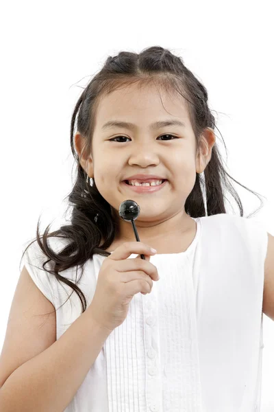 Beautiful little girl with lollipop — Stock Photo, Image