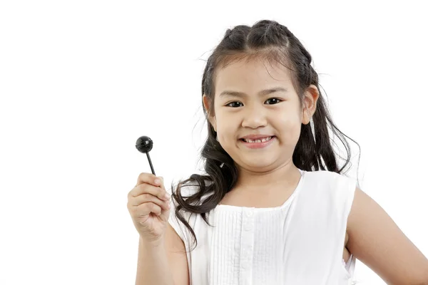 Menina bonita com pirulito — Fotografia de Stock