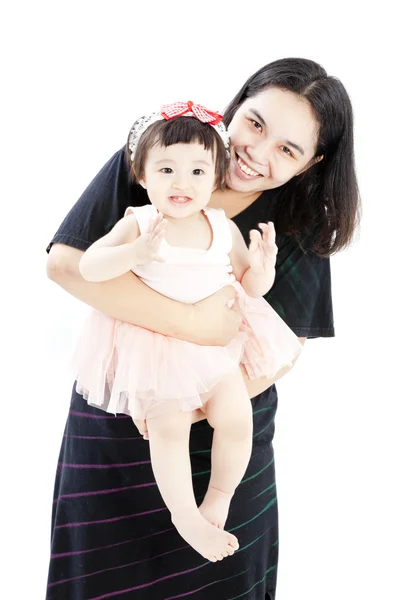 Mãe segurando doce bebê menina — Fotografia de Stock