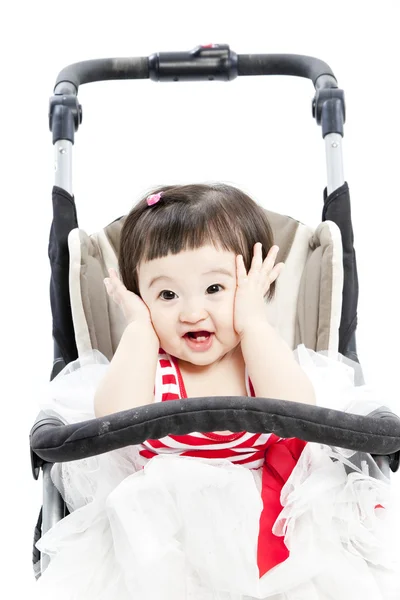 Dítě v kočárku sezení — Stock fotografie