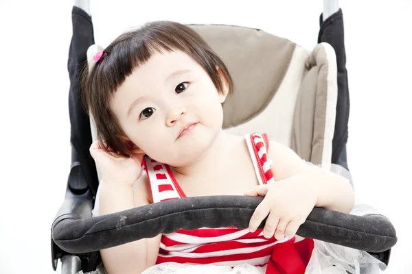 Bambino in passeggino seduto — Foto Stock