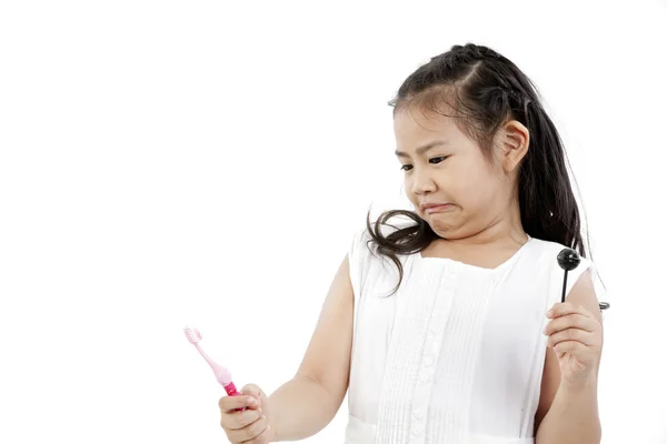 Cute asian girl and lollipop Stock Photo