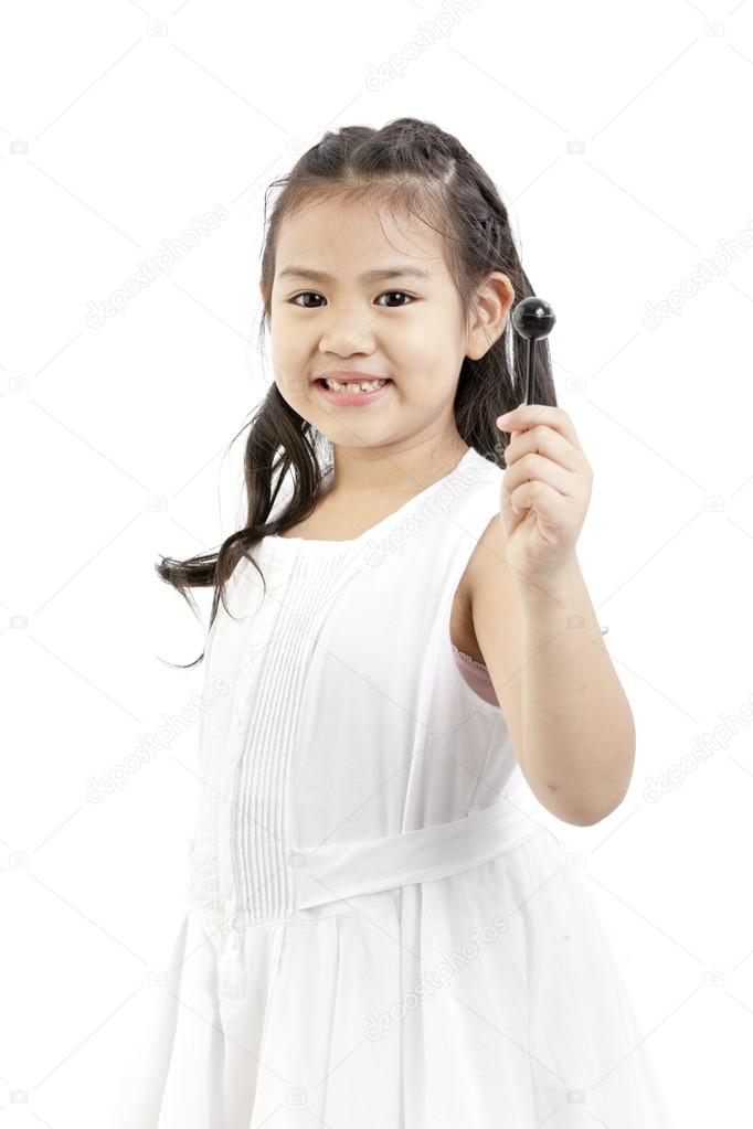 Cute asian girl and lollipop
