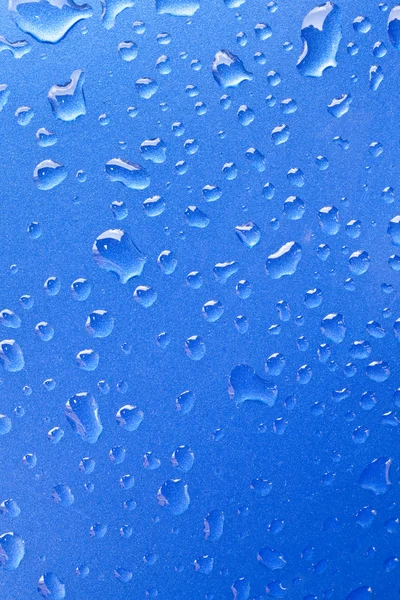 Primer plano de las gotas de agua en la superficie metálica como fondo . — Foto de Stock