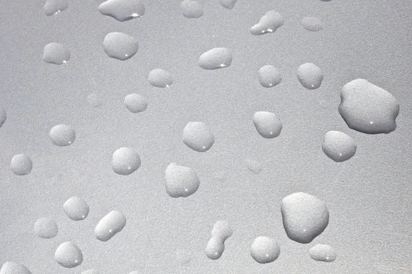 Close-up de gotas de água na superfície do metal como fundo . — Fotografia de Stock