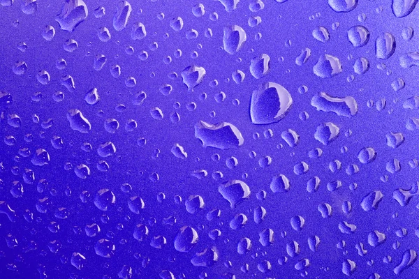 Close-up de gotas de água na superfície do metal como fundo. Azul — Fotografia de Stock